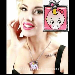 Sourpuss Cutie Pie Blushing Kewpie Doll Rope Frame Charm Necklace Pink Jewel Bow